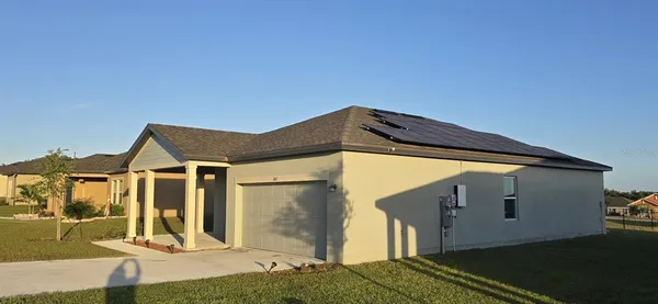 a front view of house with yard