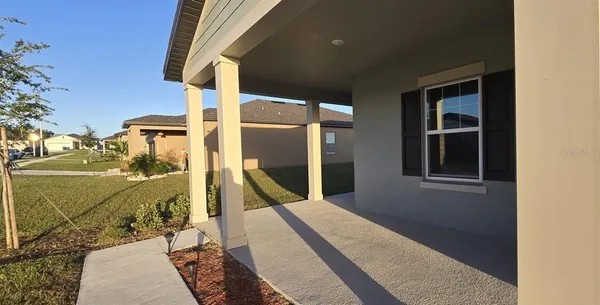 a bathroom with a toilet a sink and bathtub