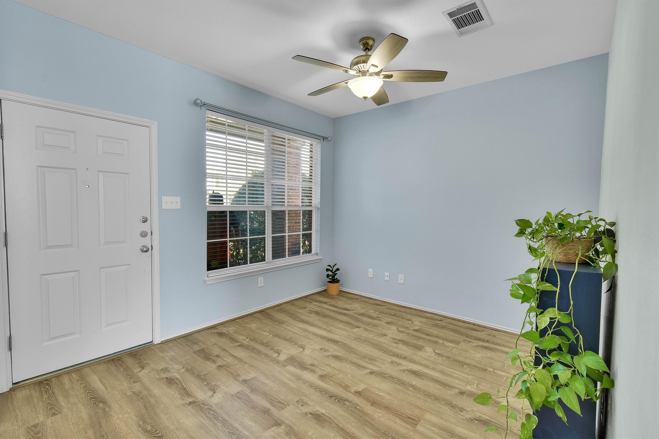 92 Verde Ranch Loop Leander, TX 78641 - Photo 7 of 37 Foyer entrance featuring light wood-style flooring and ceiling fan