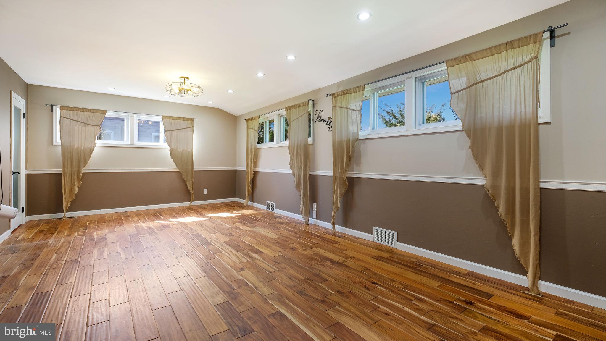1341 Carol Road Jenkintown, PA 19046 - Photo 12 of 56 a view of empty room with wooden floor