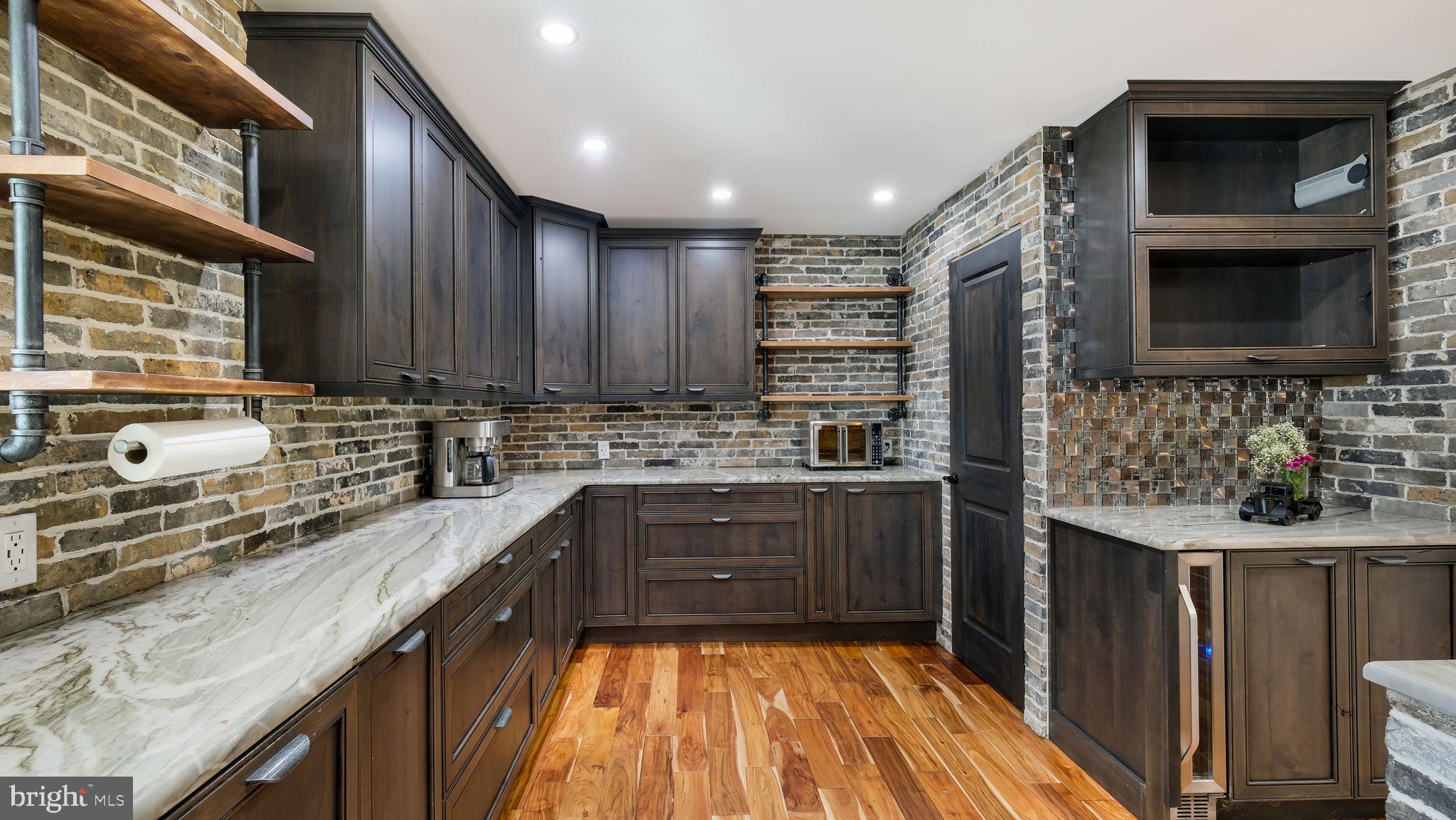 1341 Carol Road Jenkintown, PA 19046 - Photo 28 of 56 a kitchen with stainless steel appliances granite countertop a sink stove and cabinets