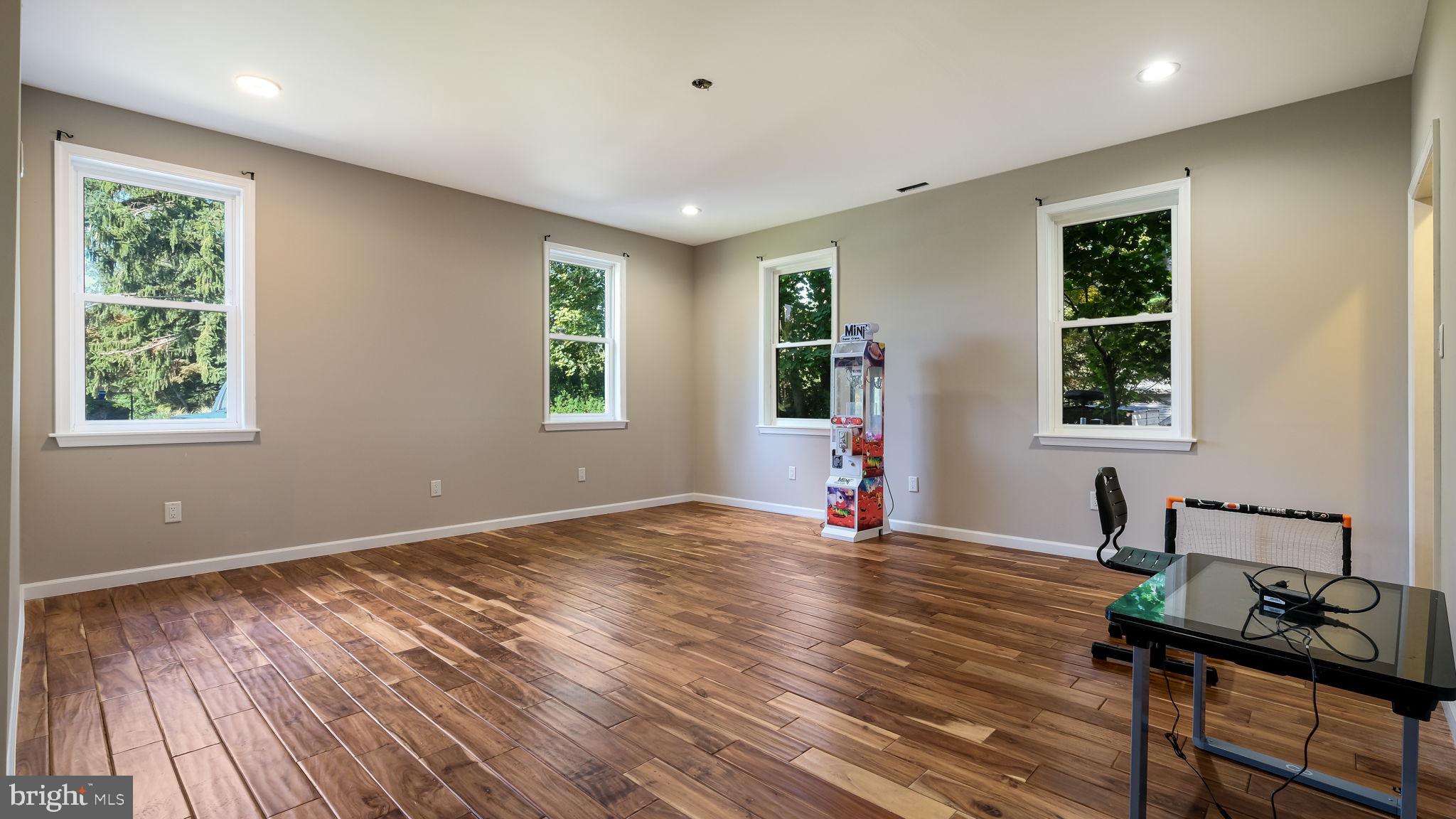 1341 Carol Road Jenkintown, PA 19046 - Photo 33 of 56 a workspace with wooden floor and windows