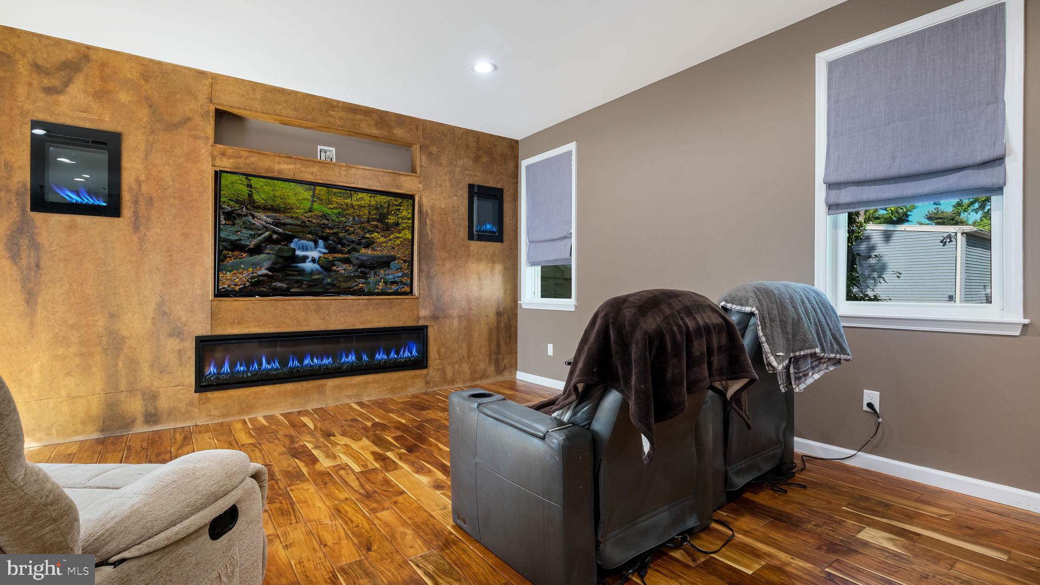 1341 Carol Road Jenkintown, PA 19046 - Photo 36 of 56 a living room with furniture and a flat screen tv