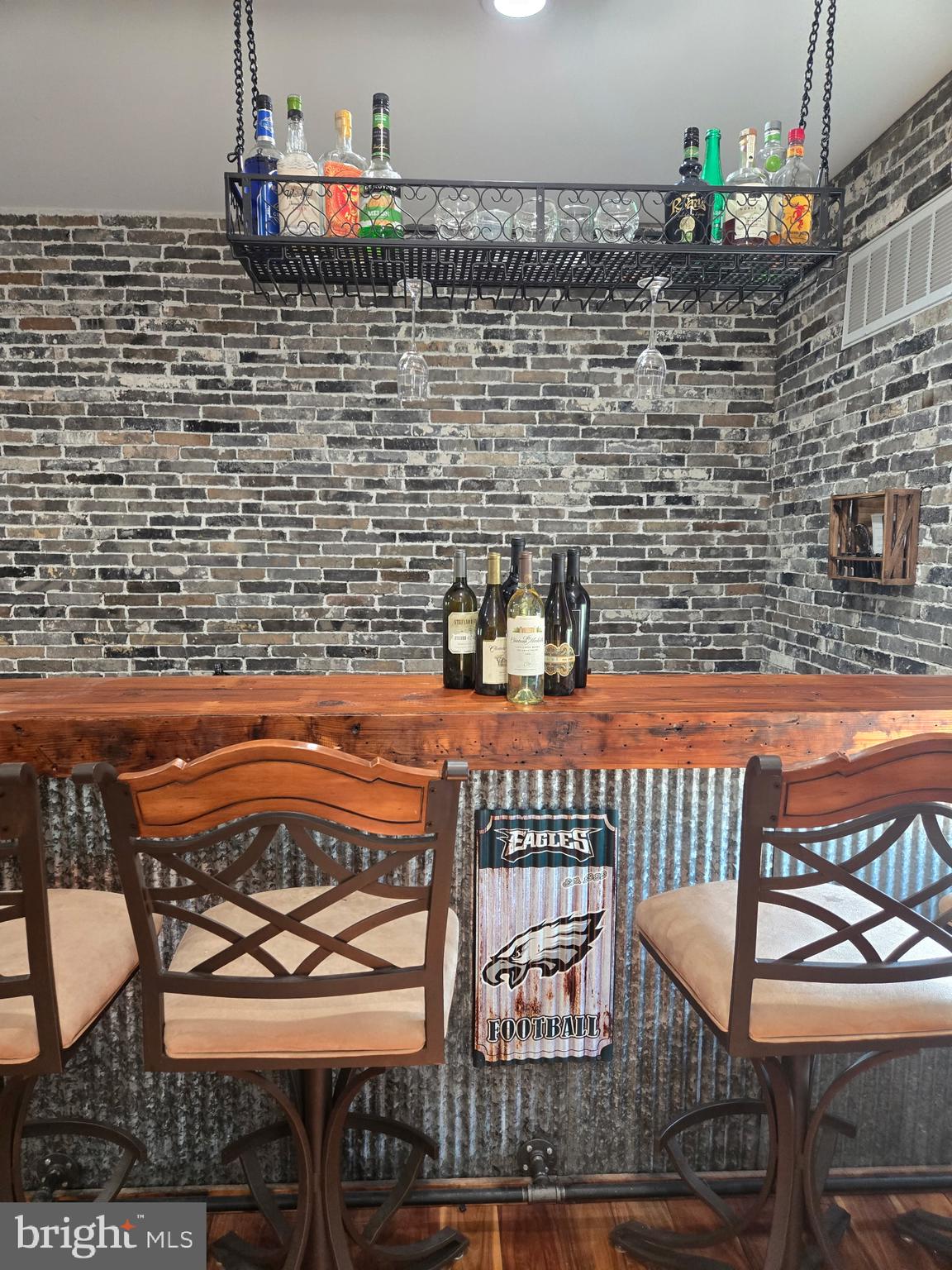 1341 Carol Road Jenkintown, PA 19046 - Photo 40 of 56 a view of a patio with table and chairs with wooden floor