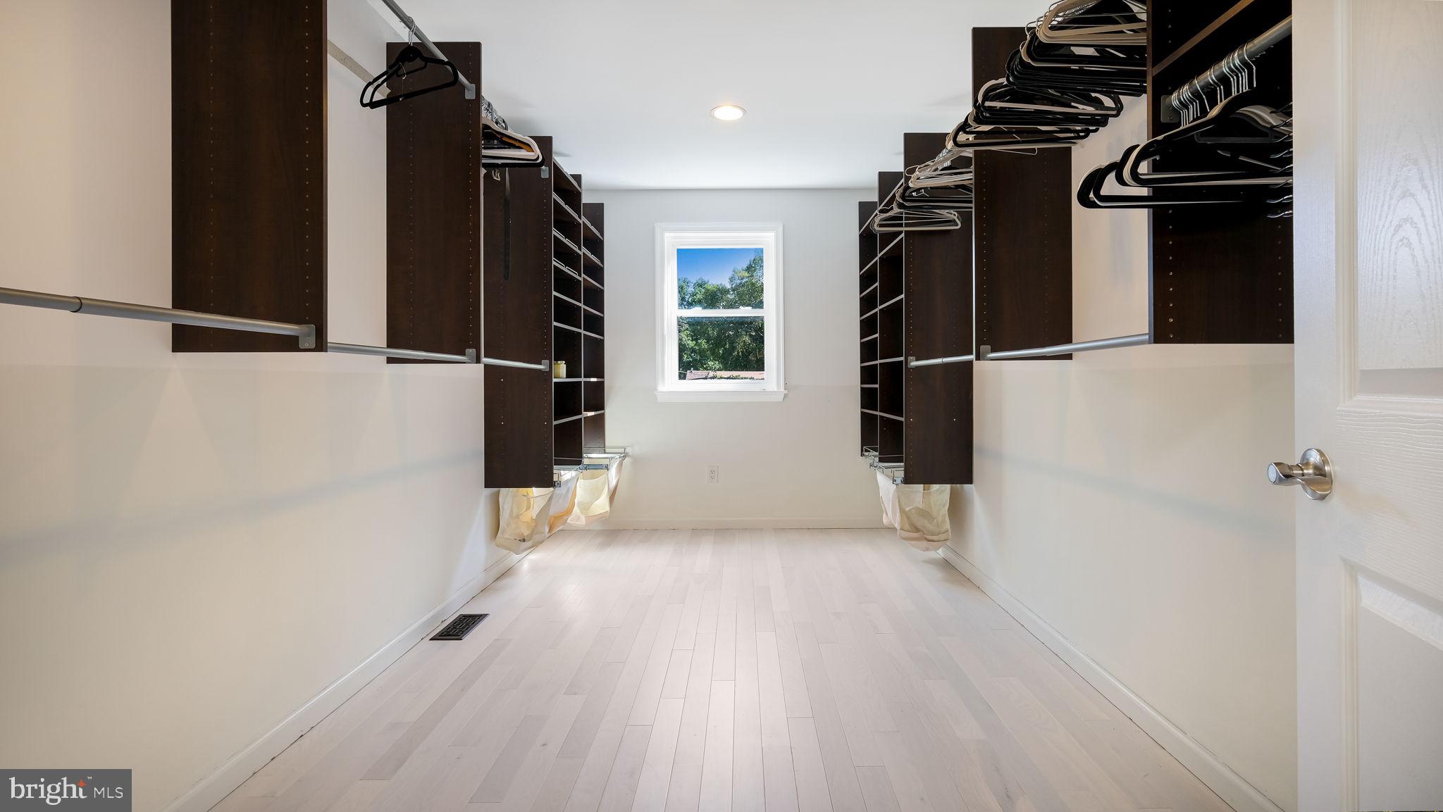 1341 Carol Road Jenkintown, PA 19046 - Photo 47 of 56 a view of walk in closet with clothes and shoes