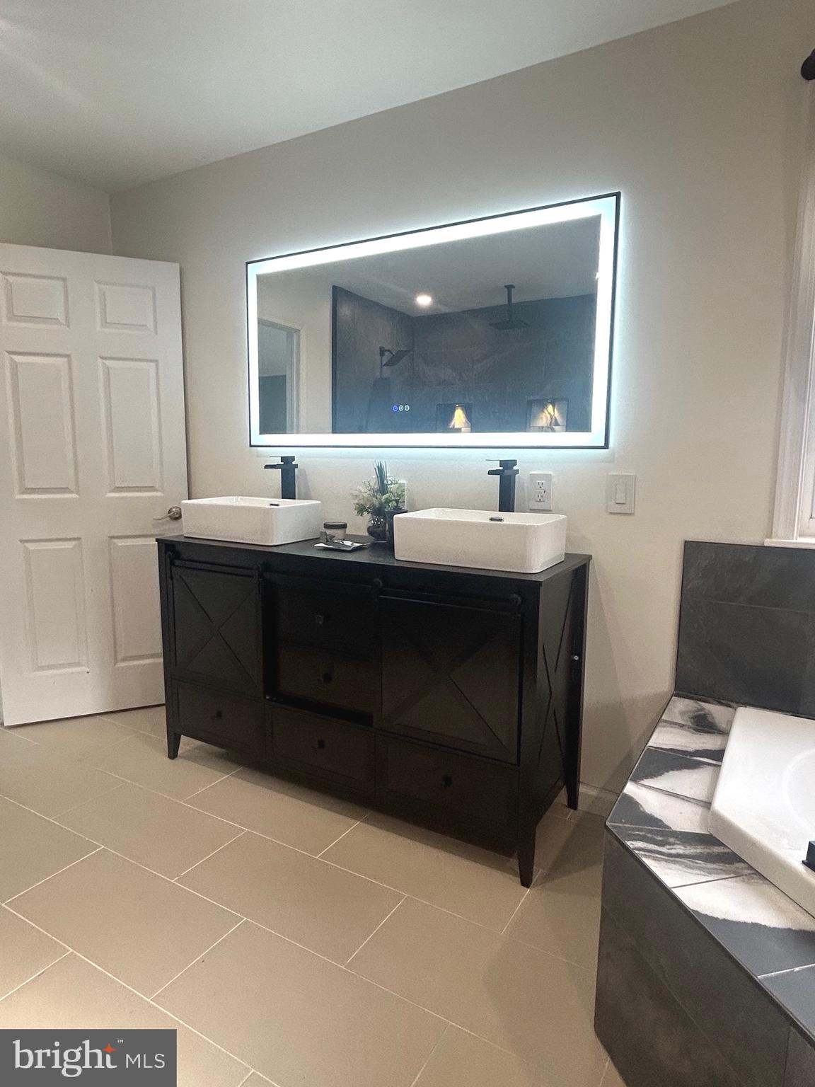 1341 Carol Road Jenkintown, PA 19046 - Photo 50 of 56 a bathroom with a sink and a mirror