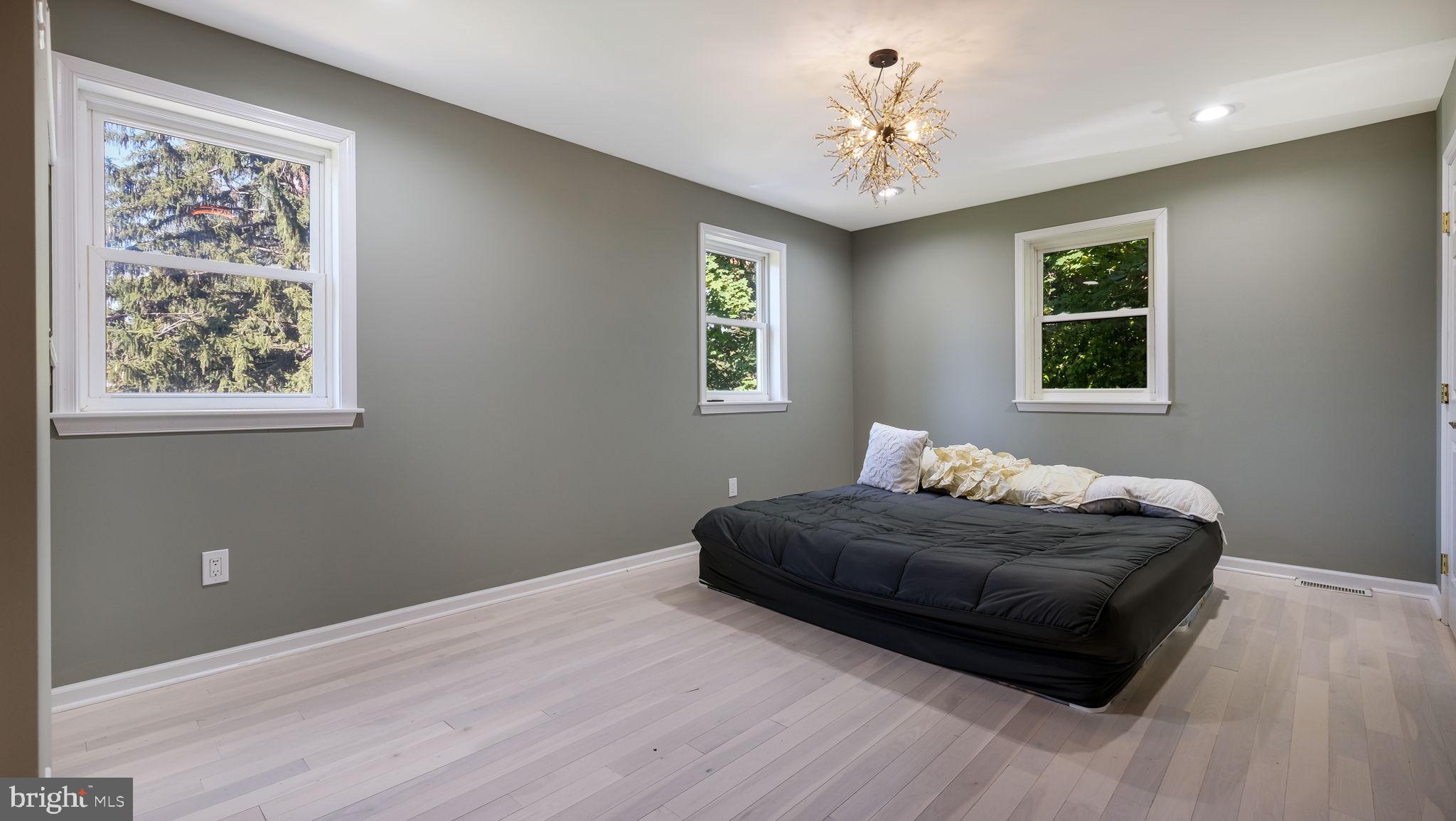 1341 Carol Road Jenkintown, PA 19046 - Photo 55 of 56 a living room with a bed furniture and a window