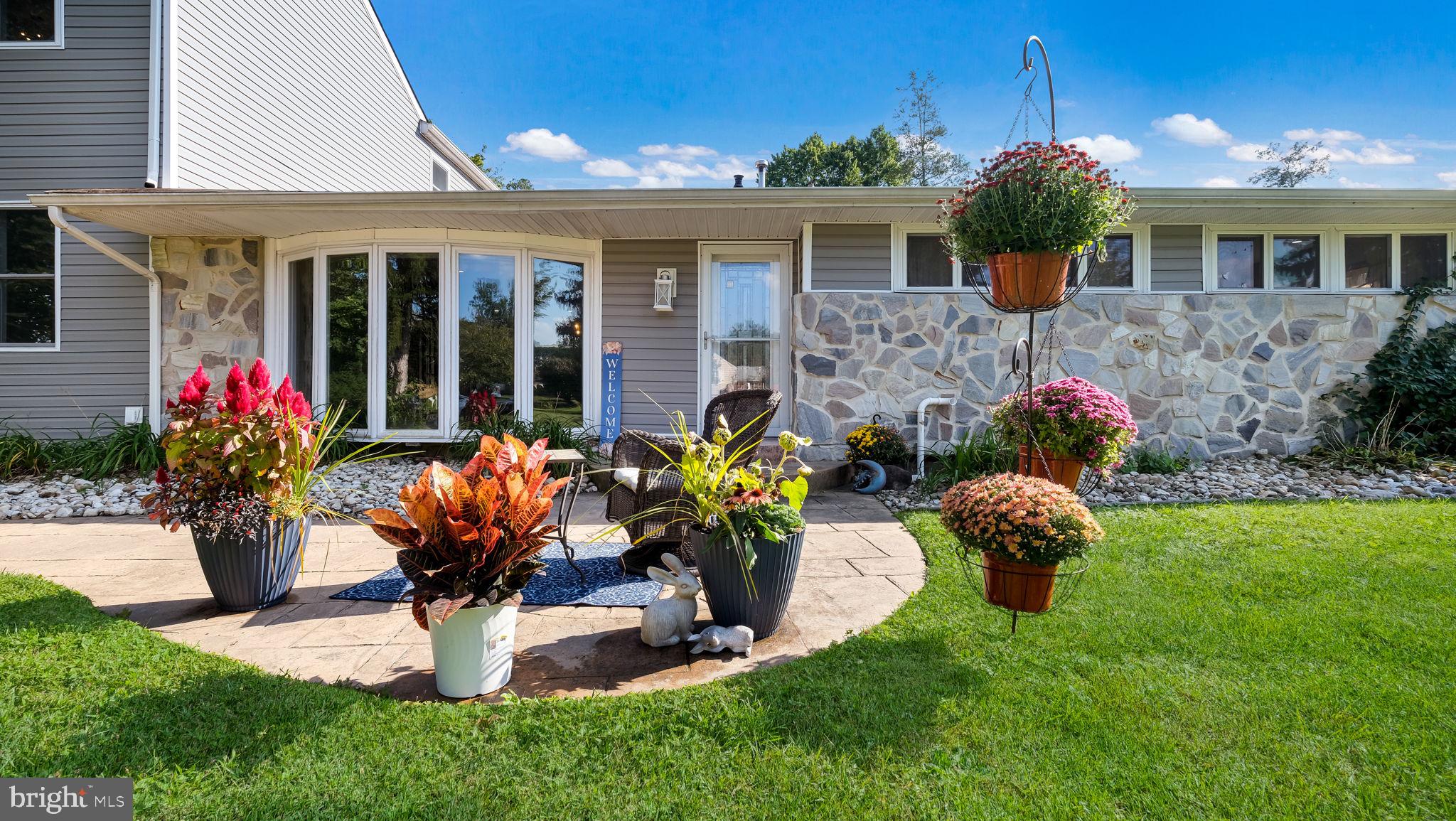 1341 Carol Road Jenkintown, PA 19046 - Photo 8 of 56 a front view of house with yard and outdoor seating