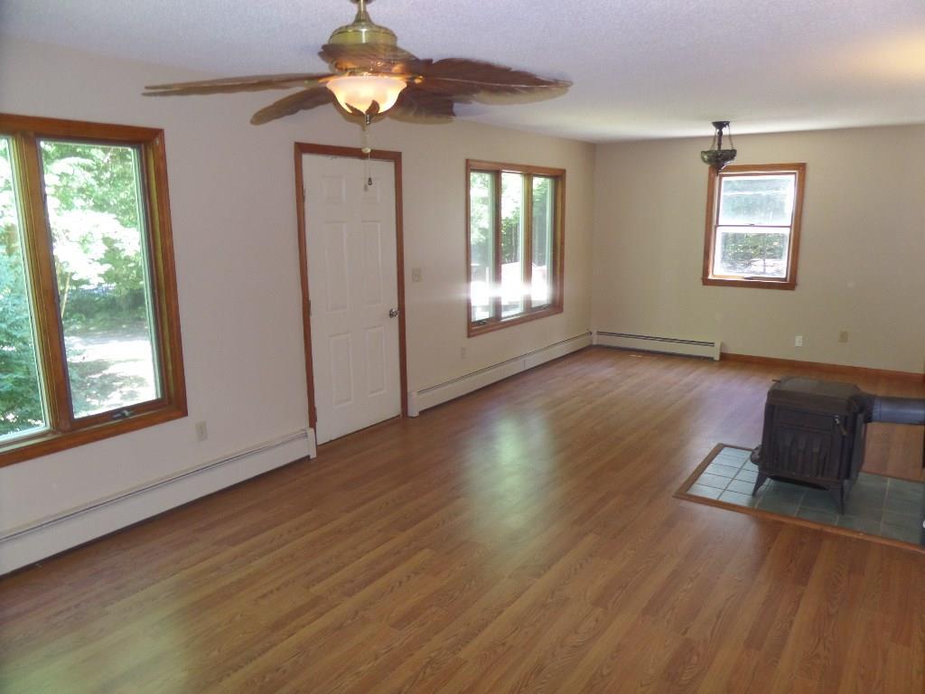 47 Bryer Heights Road Milford, ME 04461 - Photo 10 of 24 view from living room to dining area