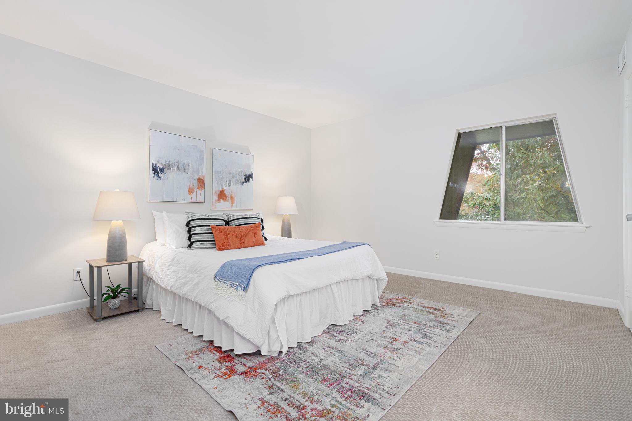 11623 Vantage Hill Road, Unit 22C Reston, VA 20190 - Photo 16 of 34 Spacious Primary bedroom with walk-in closet