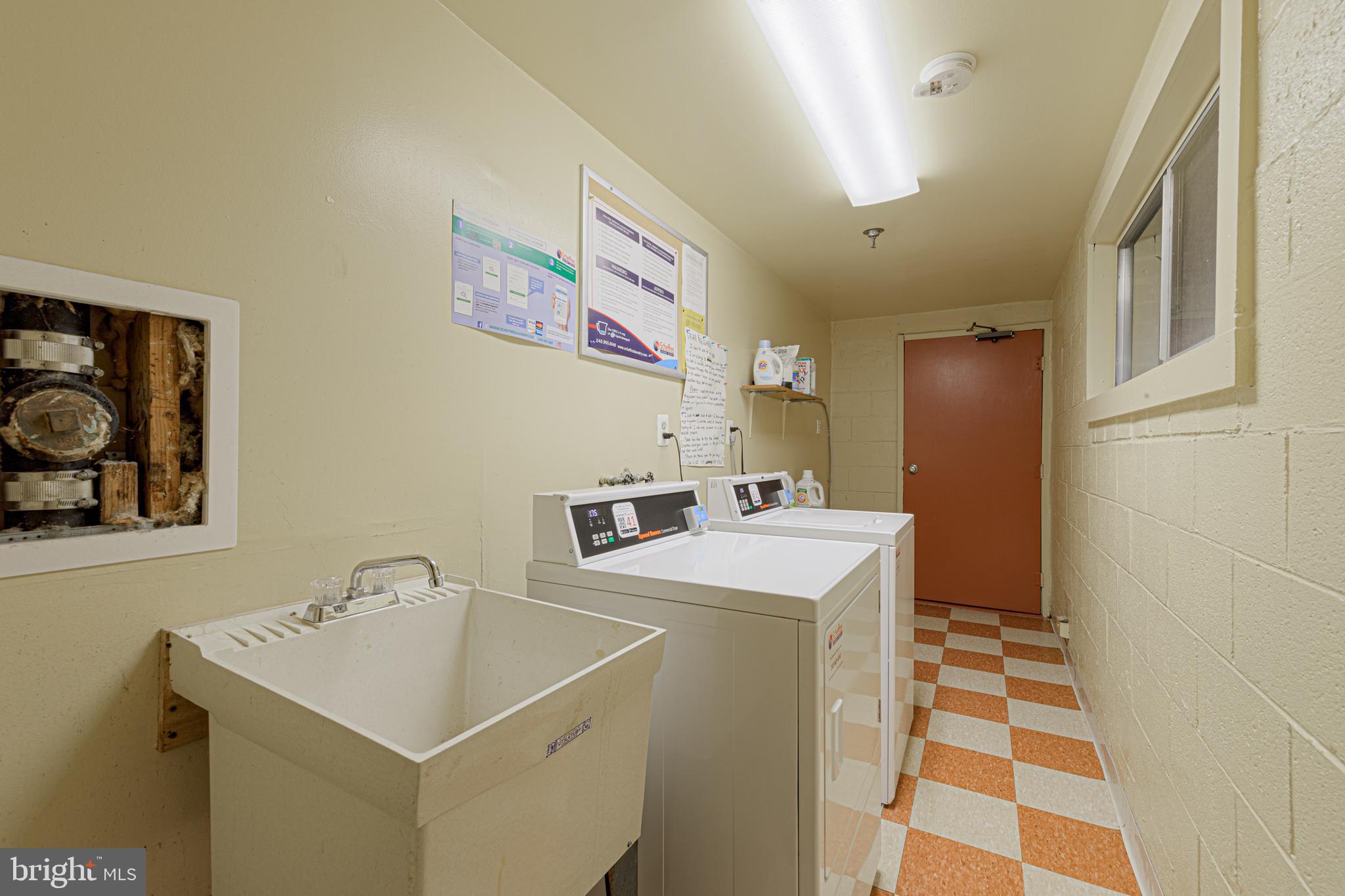 11623 Vantage Hill Road, Unit 22C Reston, VA 20190 - Photo 30 of 34 Common Laundry on lower level