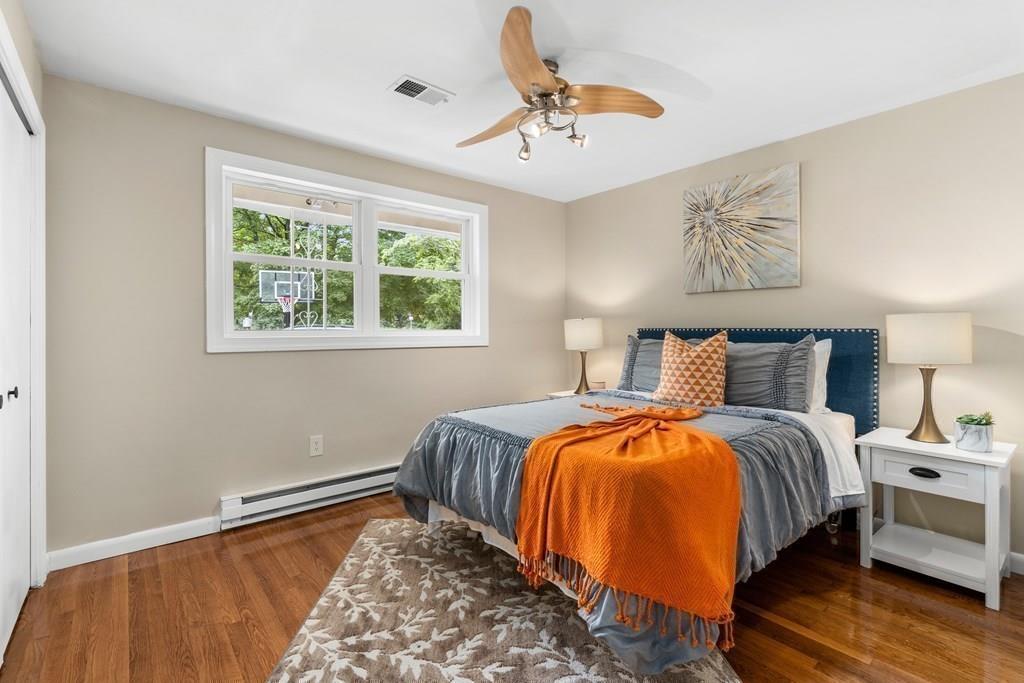 15 Pecunit Street Canton, MA 02021 - Photo 13 of 22 a bedroom with bed and window