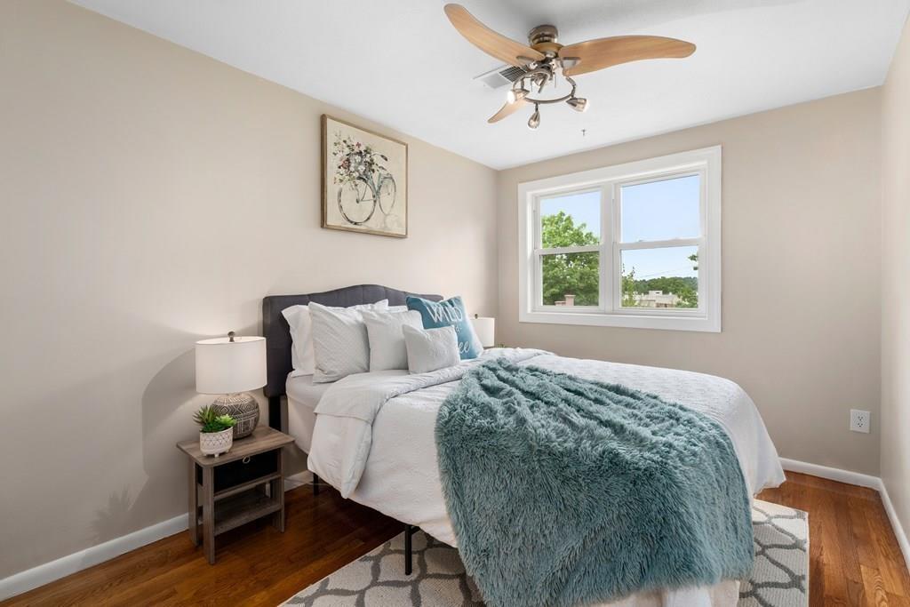 15 Pecunit Street Canton, MA 02021 - Photo 14 of 22 a bedroom with a bed and a window