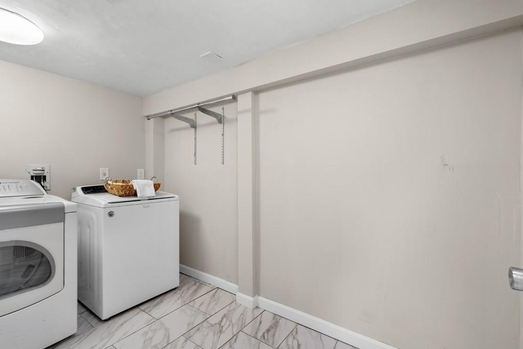 15 Pecunit Street Canton, MA 02021 - Photo 19 of 22 a utility room with dryer and washer