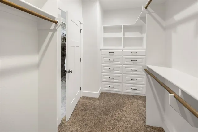 view of walk in closet with empty racks