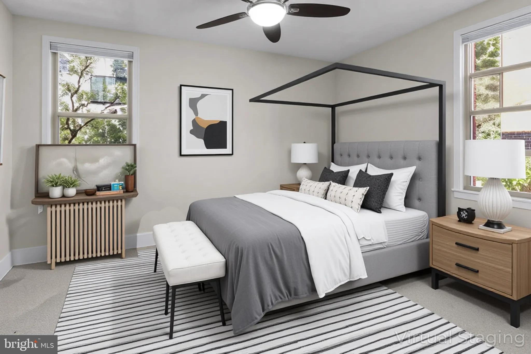 1441 Euclid Street Northwest, Unit 207 Washington, DC 20009 - Photo 18 of 23 a bedroom with a bed and a painting on the wall