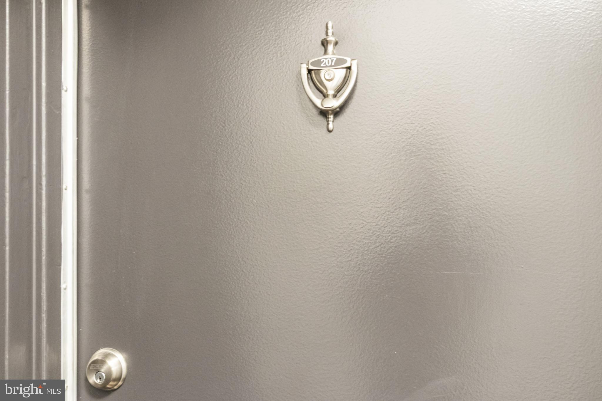 1441 Euclid Street Northwest, Unit 207 Washington, DC 20009 - Photo 5 of 23 an empty room with a window