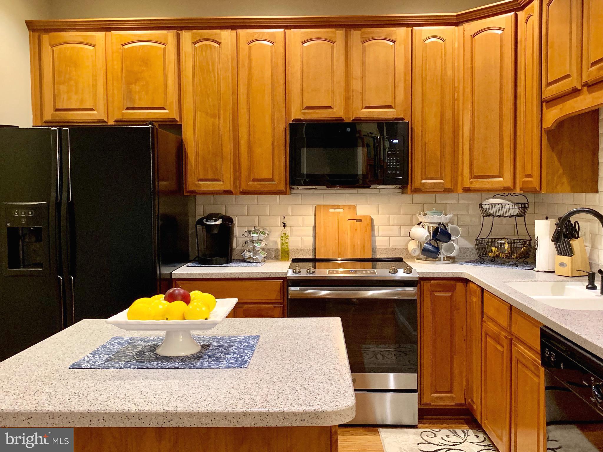 226 West Ridge Court Warrenton, VA 20186 - Photo 18 of 43 Large island offering additional sitting