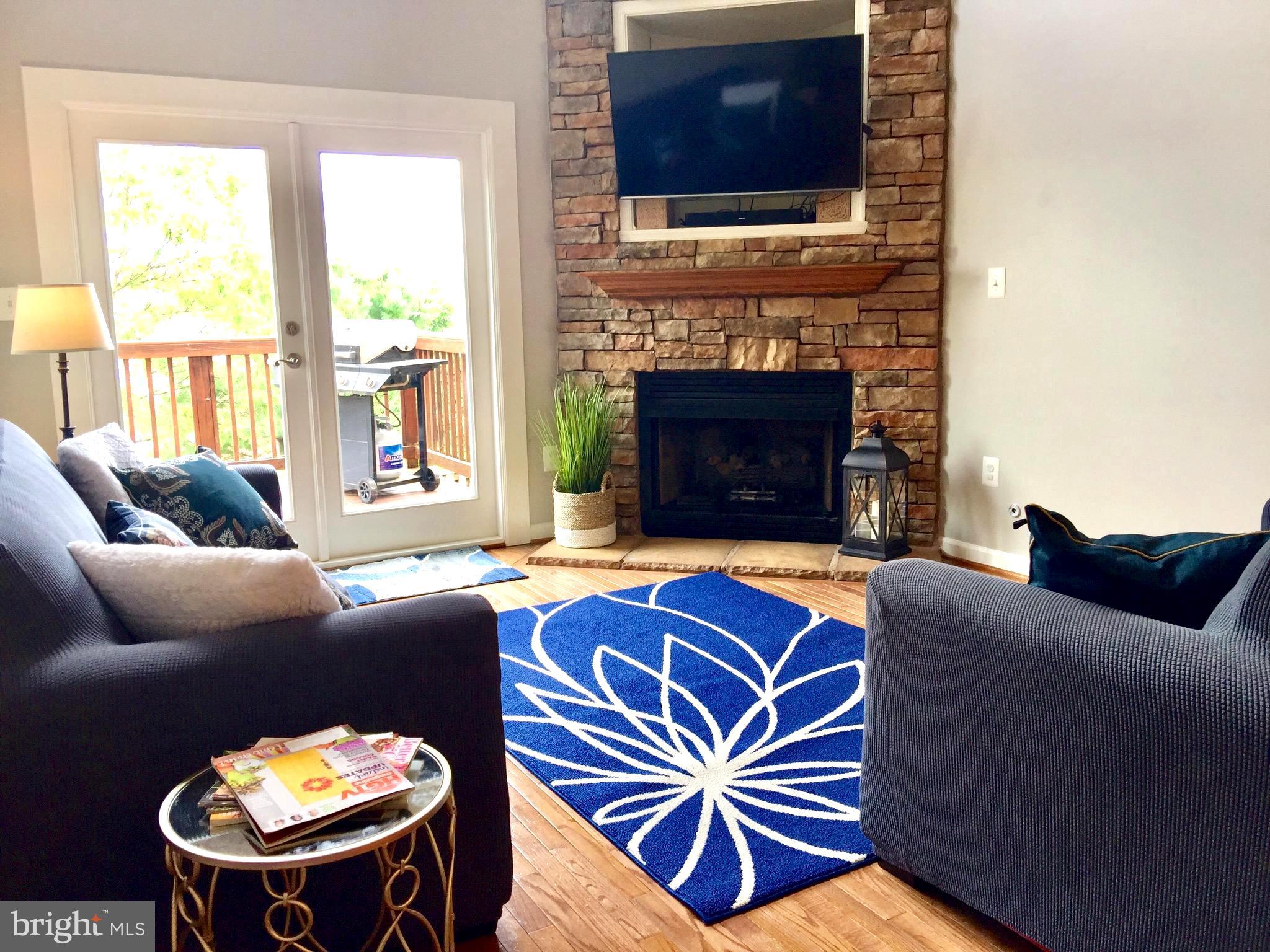 226 West Ridge Court Warrenton, VA 20186 - Photo 7 of 43 Open family room w/gas fireplace