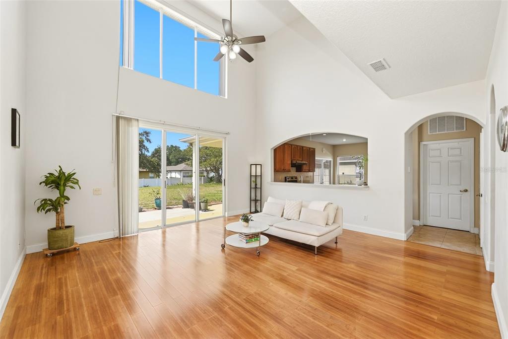 936 Kingsridge Circle Gotha, FL 34734 - Photo 6 of 50 a living room with furniture and wooden floor