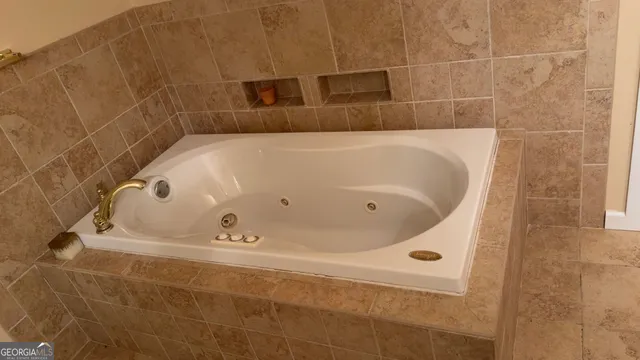 a bathroom with a sink a toilet and vanity