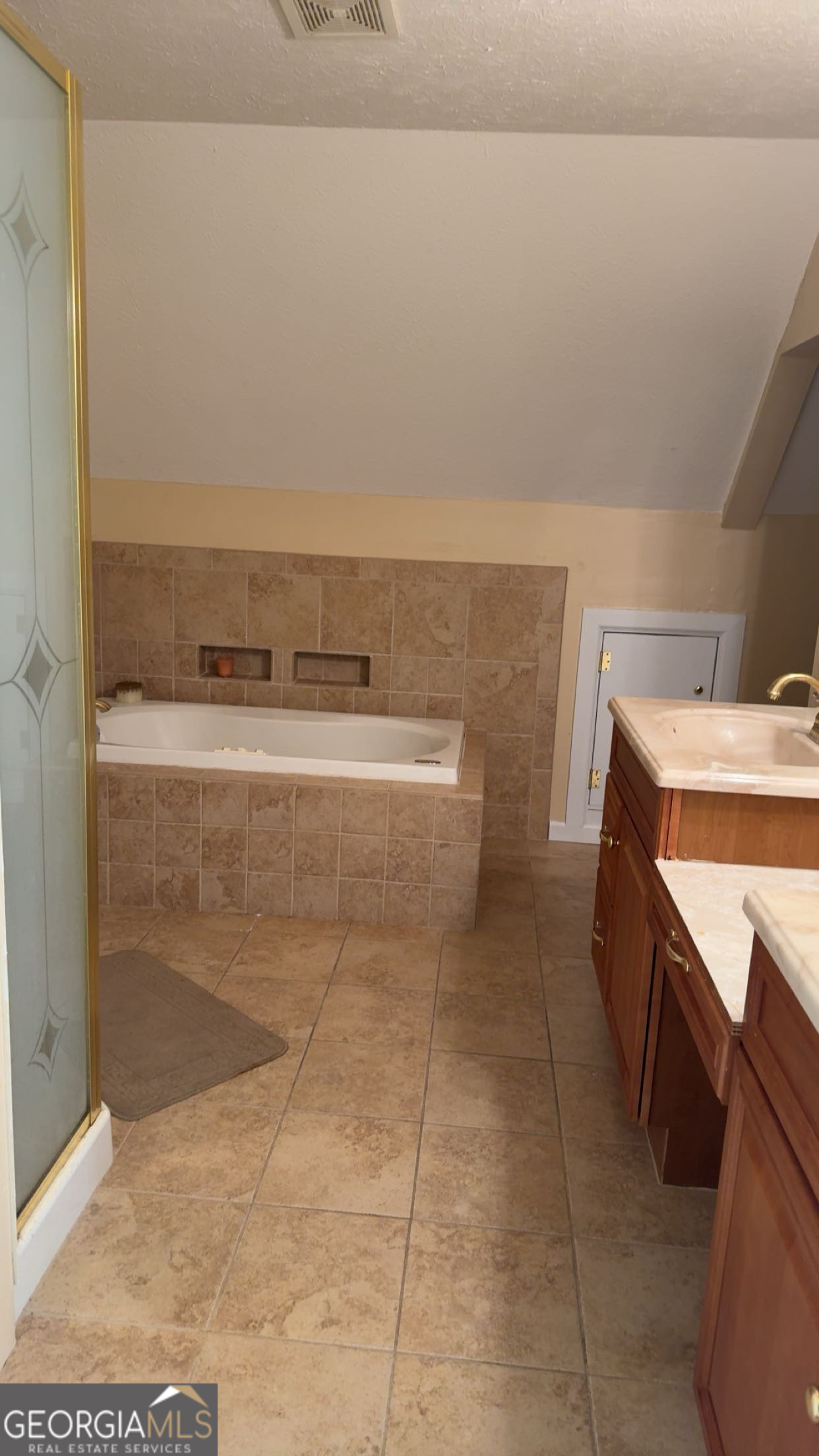 621 Highway 22 Sparta, GA 31087 - Photo 16 of 36 a bathroom with a sink a toilet and vanity