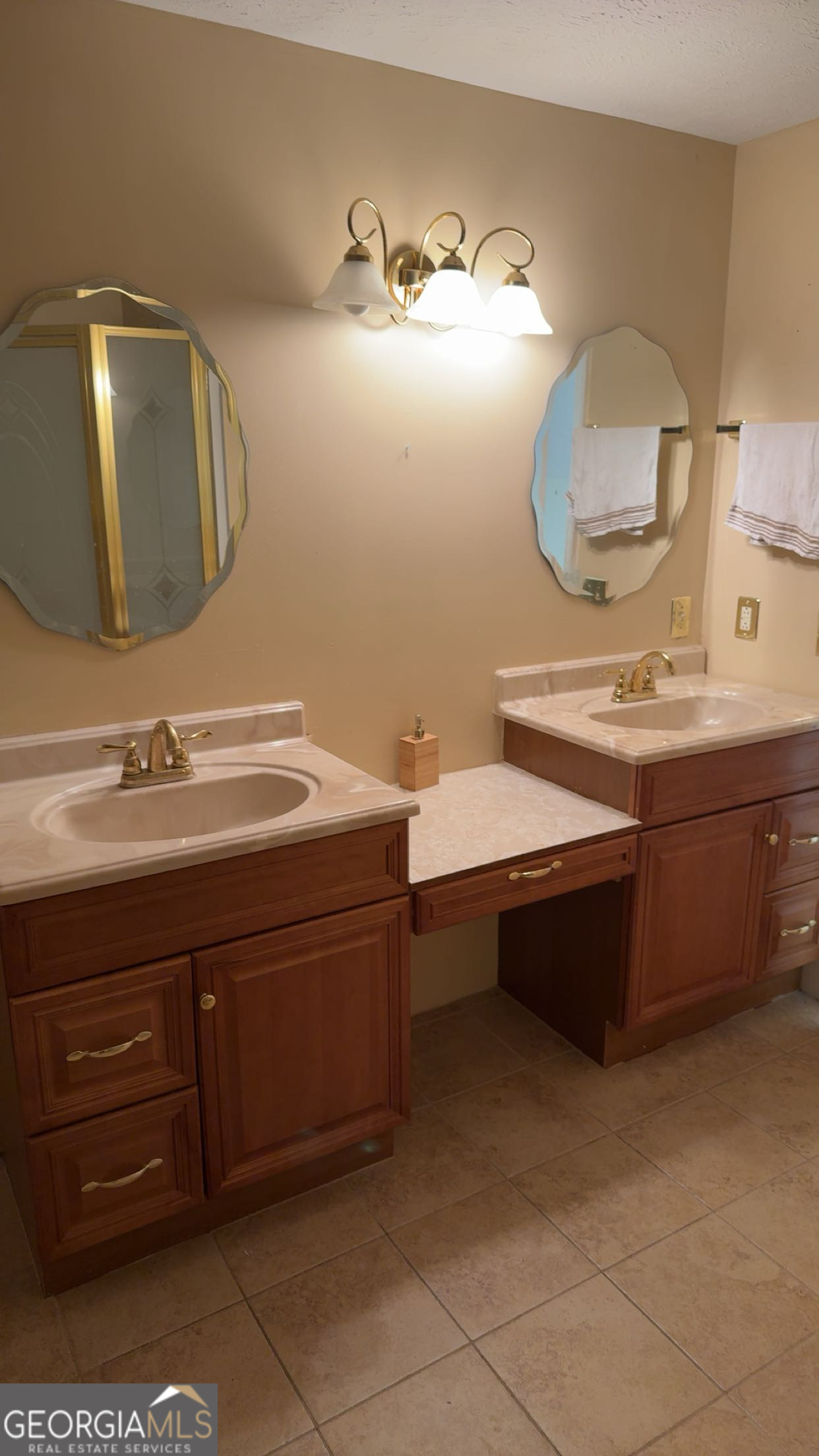 621 Highway 22 Sparta, GA 31087 - Photo 17 of 36 a bathroom with a sink and a mirror