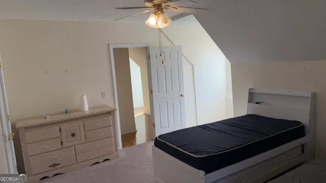 a bathroom with a toilet and a sink