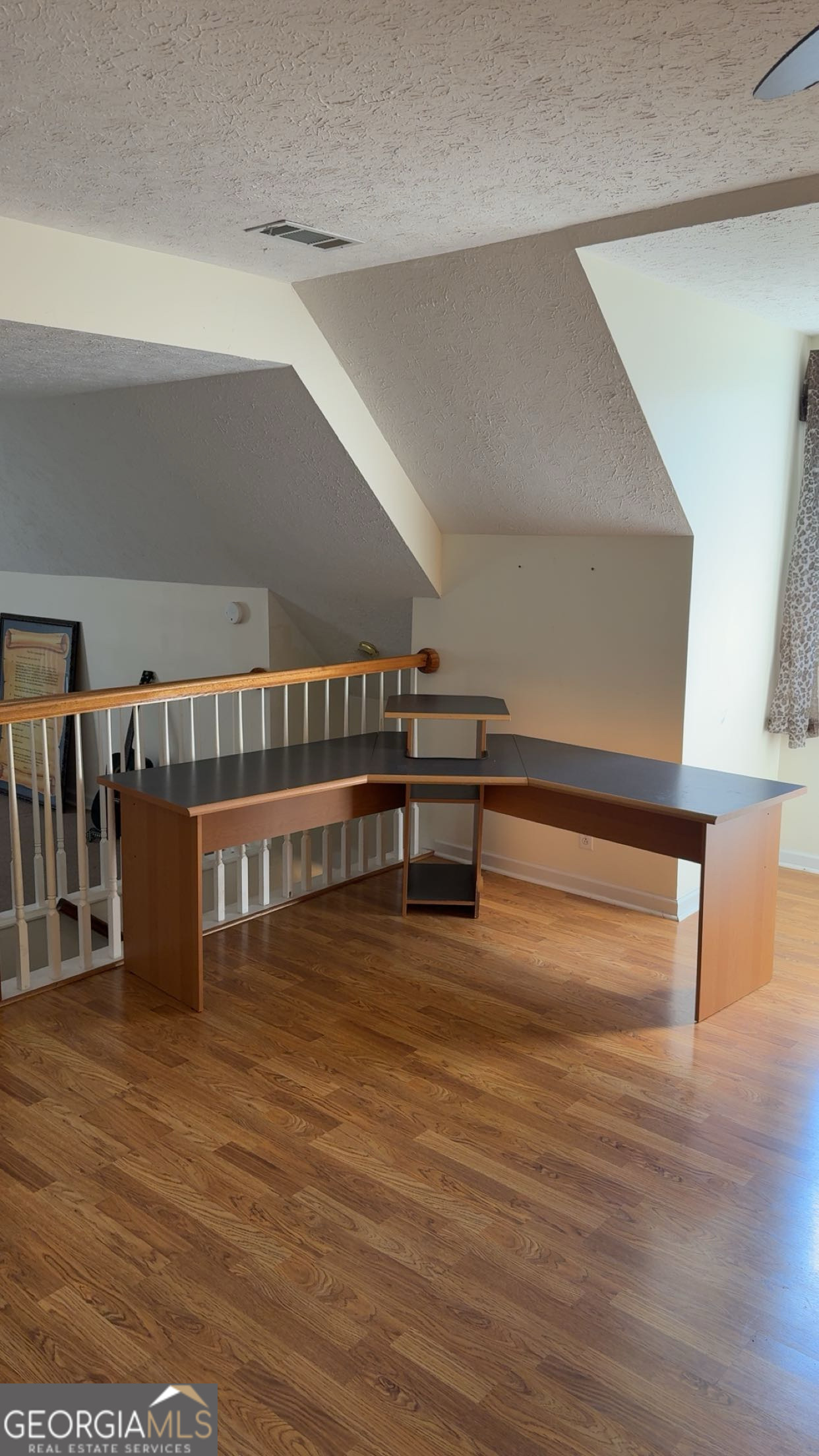 621 Highway 22 Sparta, GA 31087 - Photo 30 of 36 a view of entryway and hall with wooden floor