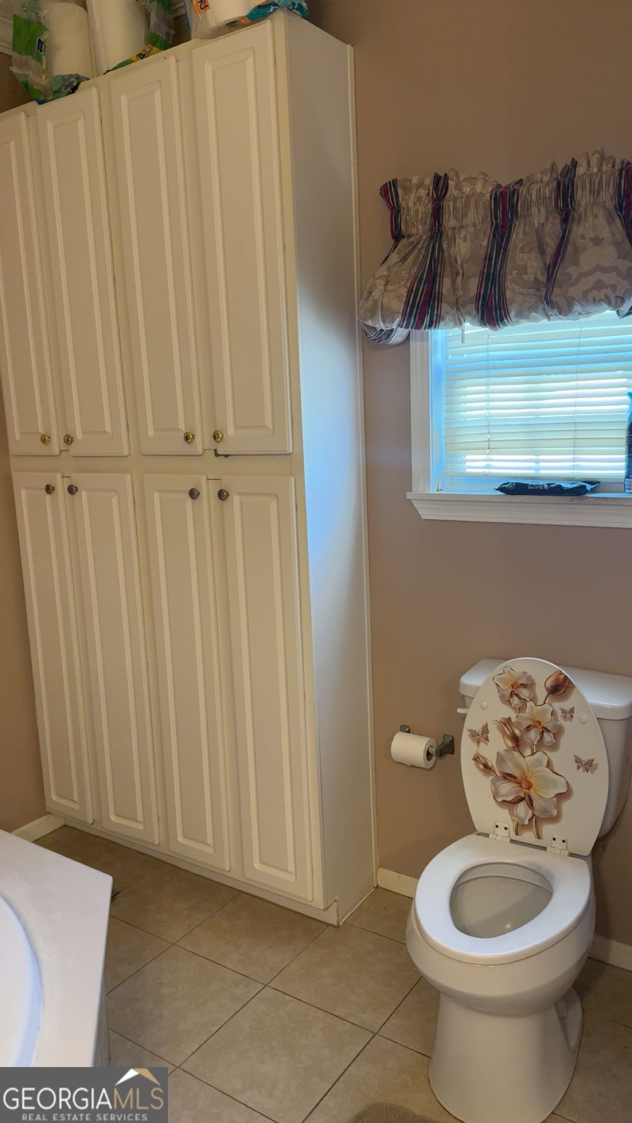 621 Highway 22 Sparta, GA 31087 - Photo 31 of 36 a bathroom with a toilet and a sink