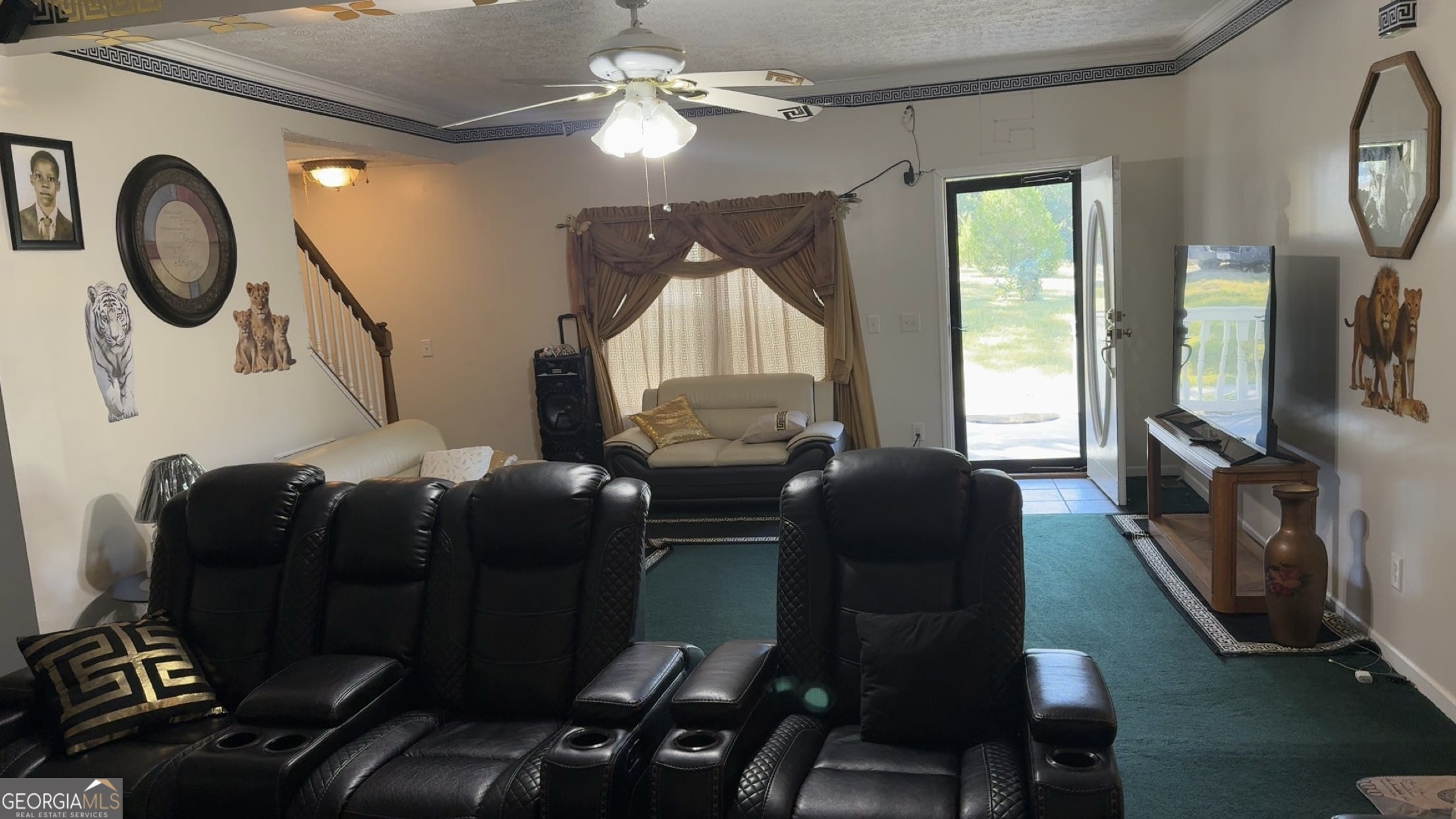 621 Highway 22 Sparta, GA 31087 - Photo 7 of 36 a living room with furniture and a flat screen tv