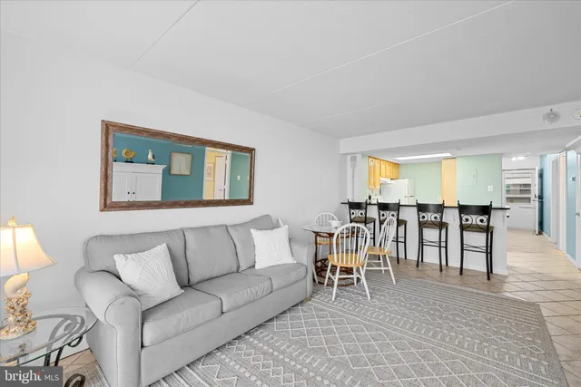 a bedroom with a bed and a night stand