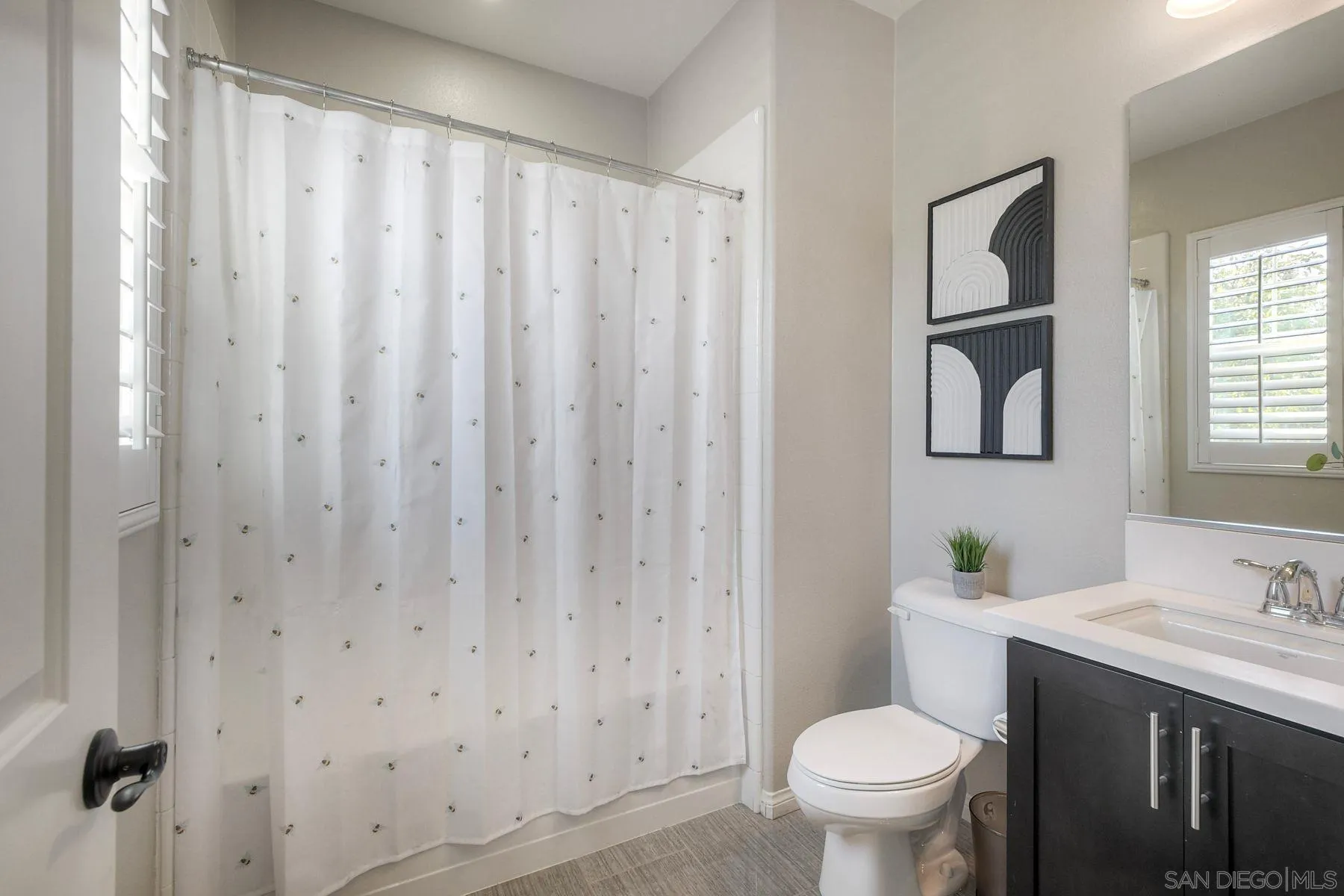 16482 Edgehill Road San Diego, CA 92127 - Photo 21 of 35 a bathroom with a granite countertop toilet and a sink