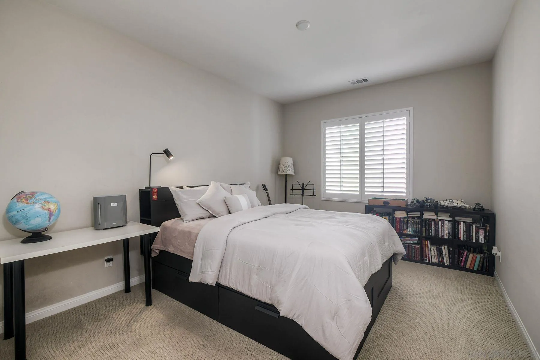 16482 Edgehill Road San Diego, CA 92127 - Photo 25 of 35 a bedroom with a bed and a window