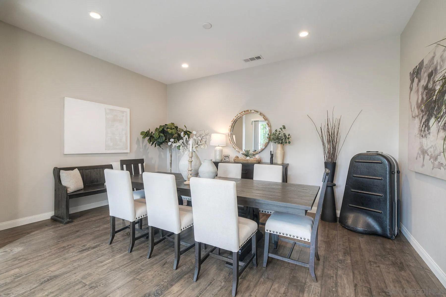 16482 Edgehill Road San Diego, CA 92127 - Photo 4 of 35 a view of a dining room with furniture and wooden floor