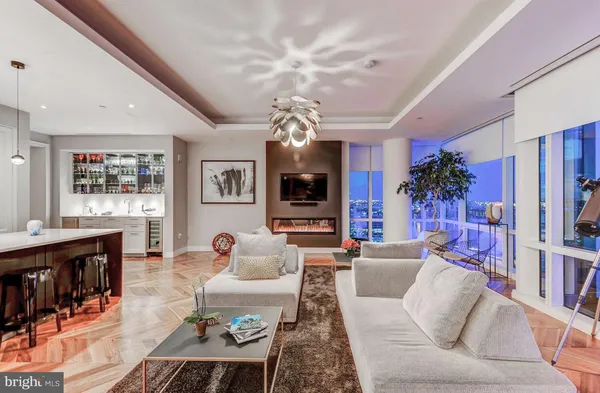 a view of a living room and dining room