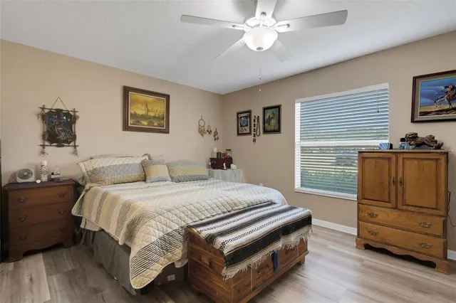 a bedroom with a bed and furniture