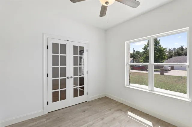 an empty room with windows