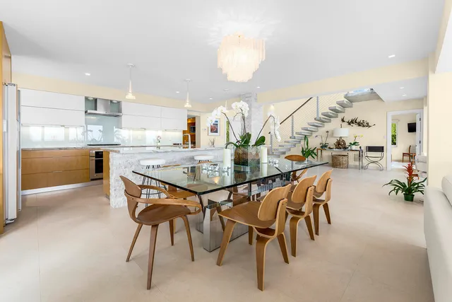 a bathroom with a bathtub shower sink and toilet