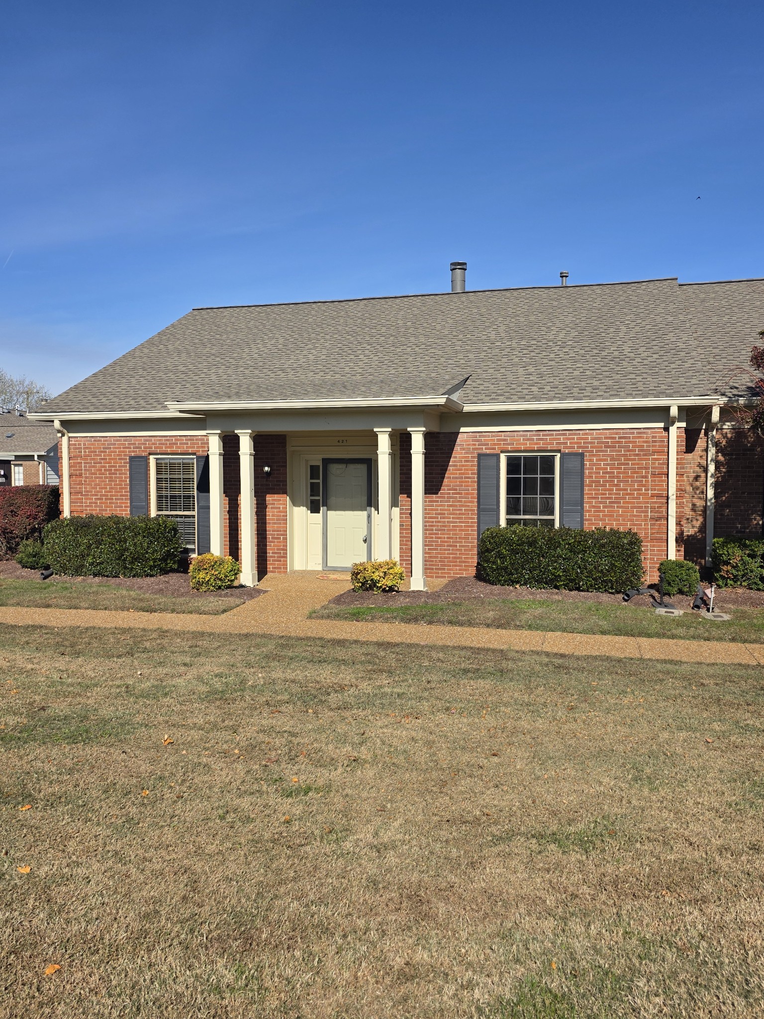 421 General George Patton Road Nashville, TN 37221 - Photo 3 of 33 a front view of a house with a garden