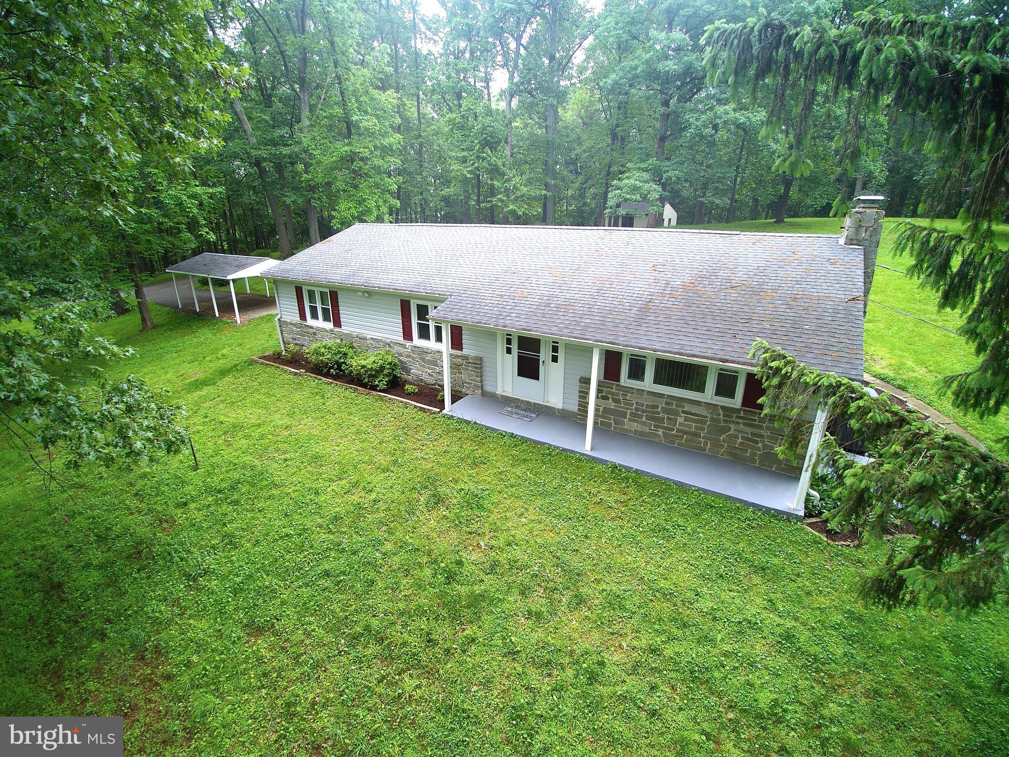 1213 Watervale Road Fallston, MD 21047 - Photo 1 of 30 a view of a house with a big yard plants and large trees