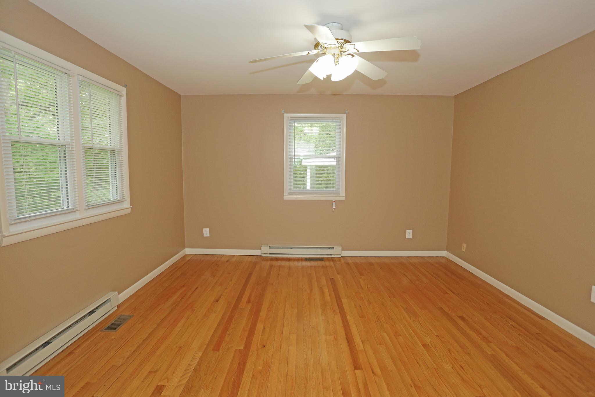 1213 Watervale Road Fallston, MD 21047 - Photo 17 of 30 a view of an empty room with a window and wooden floor