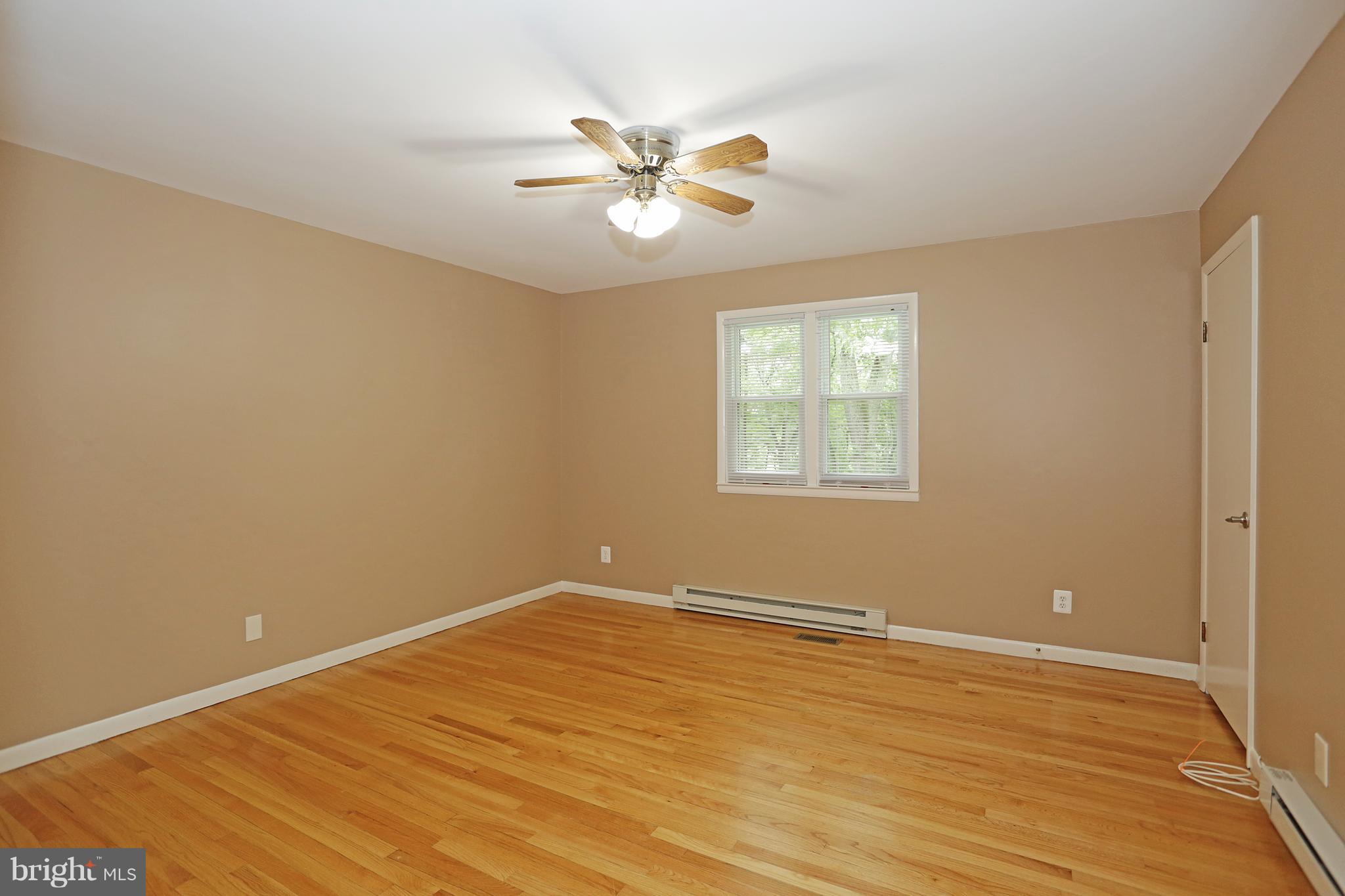 1213 Watervale Road Fallston, MD 21047 - Photo 19 of 30 a view of a big room with wooden floor and windows