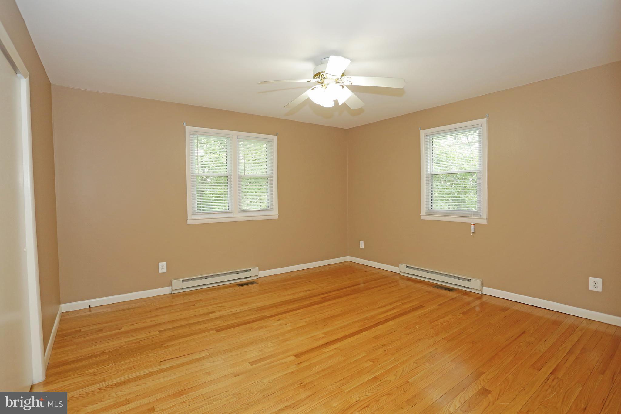 1213 Watervale Road Fallston, MD 21047 - Photo 21 of 30 a view of an empty room with wooden floor and a window
