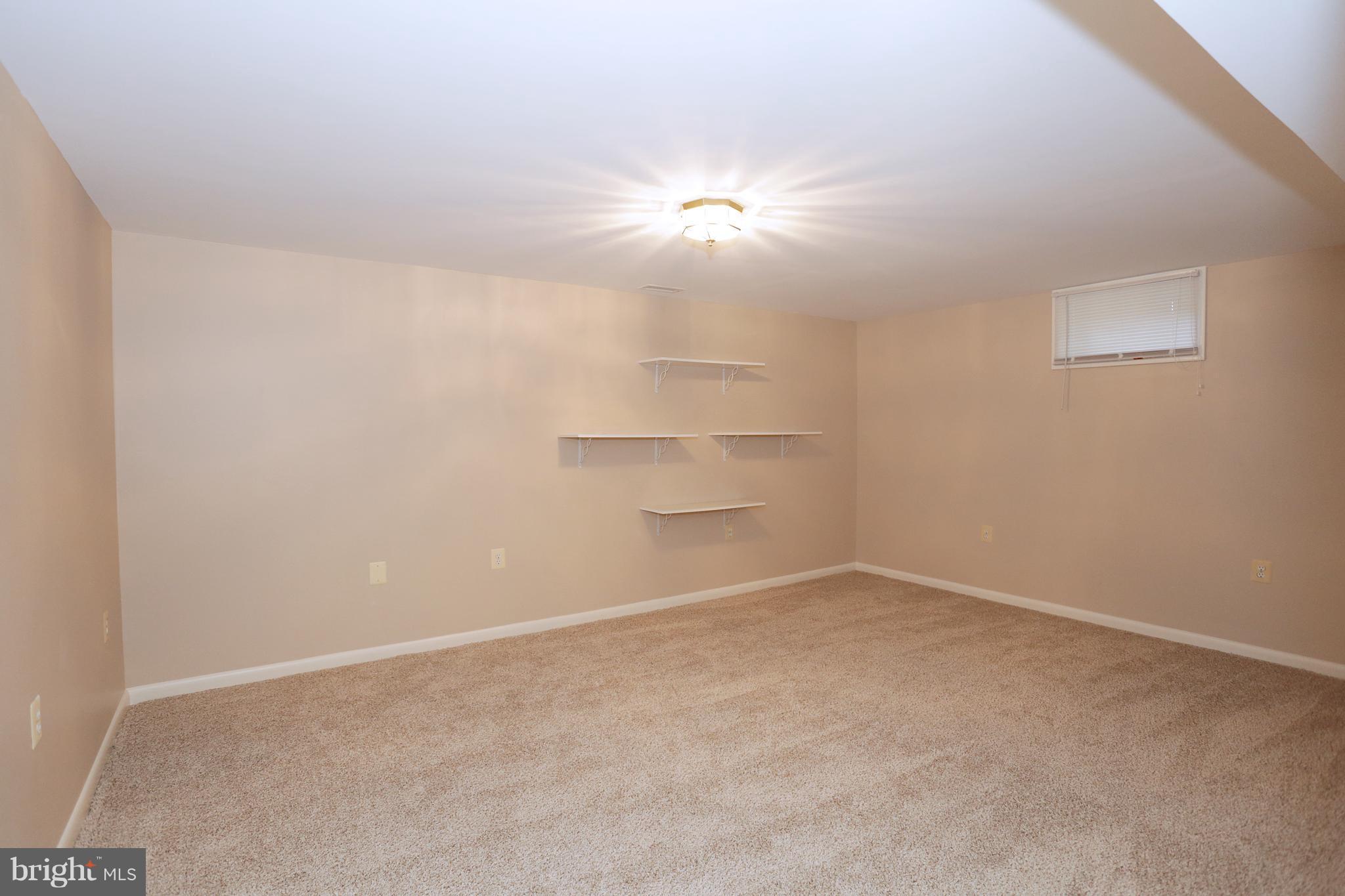 1213 Watervale Road Fallston, MD 21047 - Photo 24 of 30 an empty room with a empty space and a ceiling fan