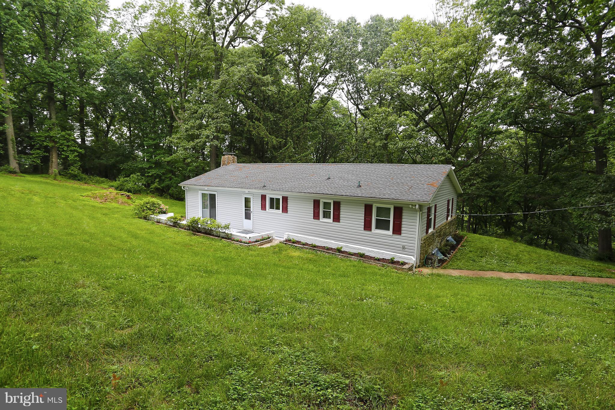 1213 Watervale Road Fallston, MD 21047 - Photo 7 of 30 a view of a house with a big yard and large trees