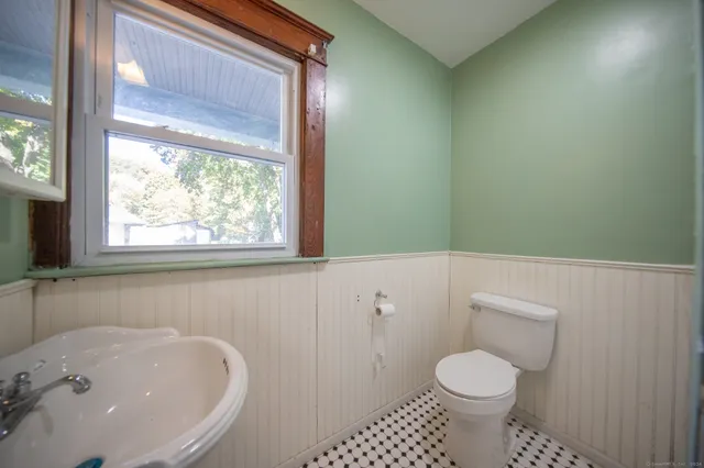 a bathroom with a sink and a toilet