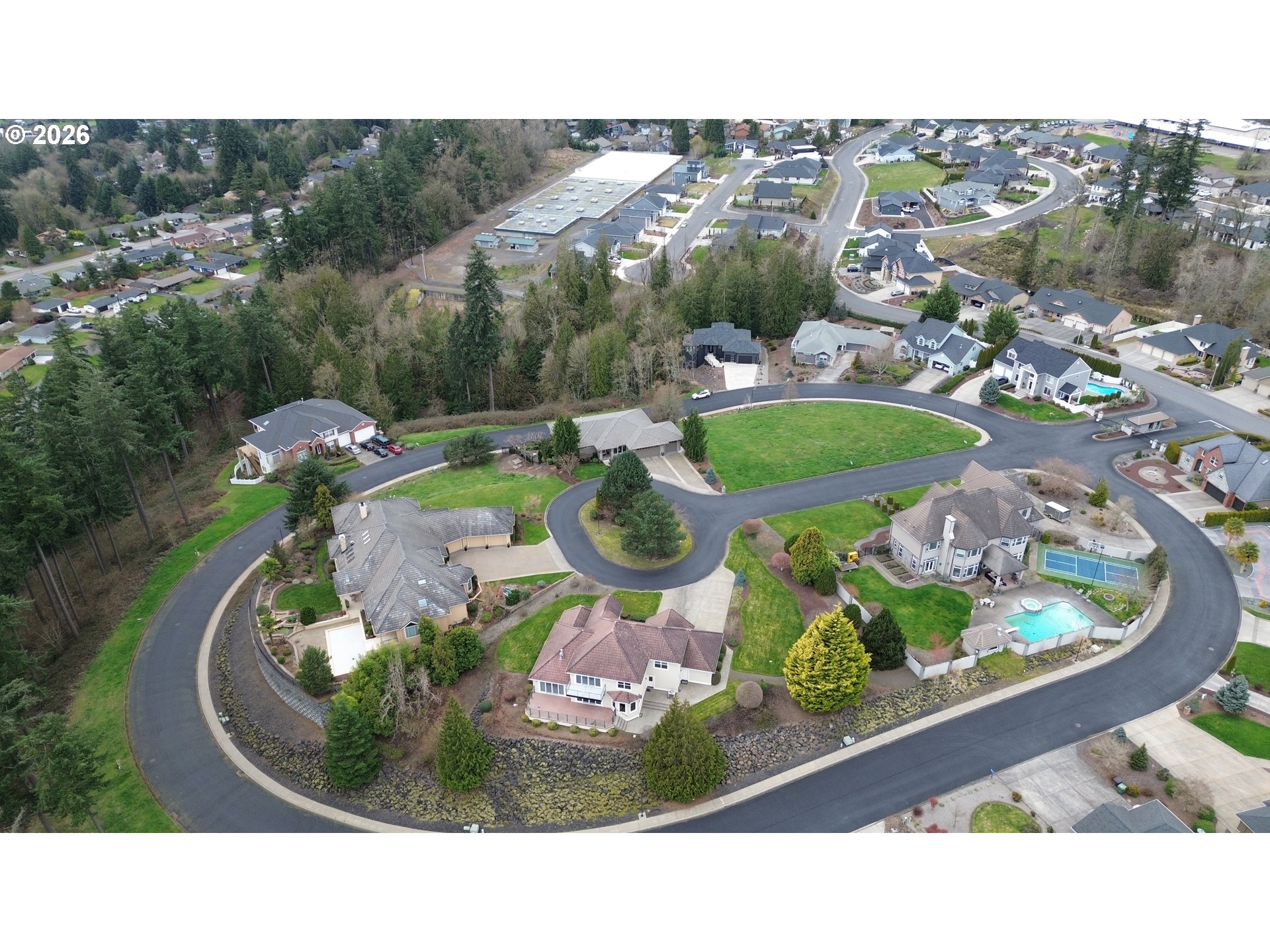 4 Forest Hill Estate Longview, WA 98632 - Photo 1 of 12 a view of a swimming pool with a garden