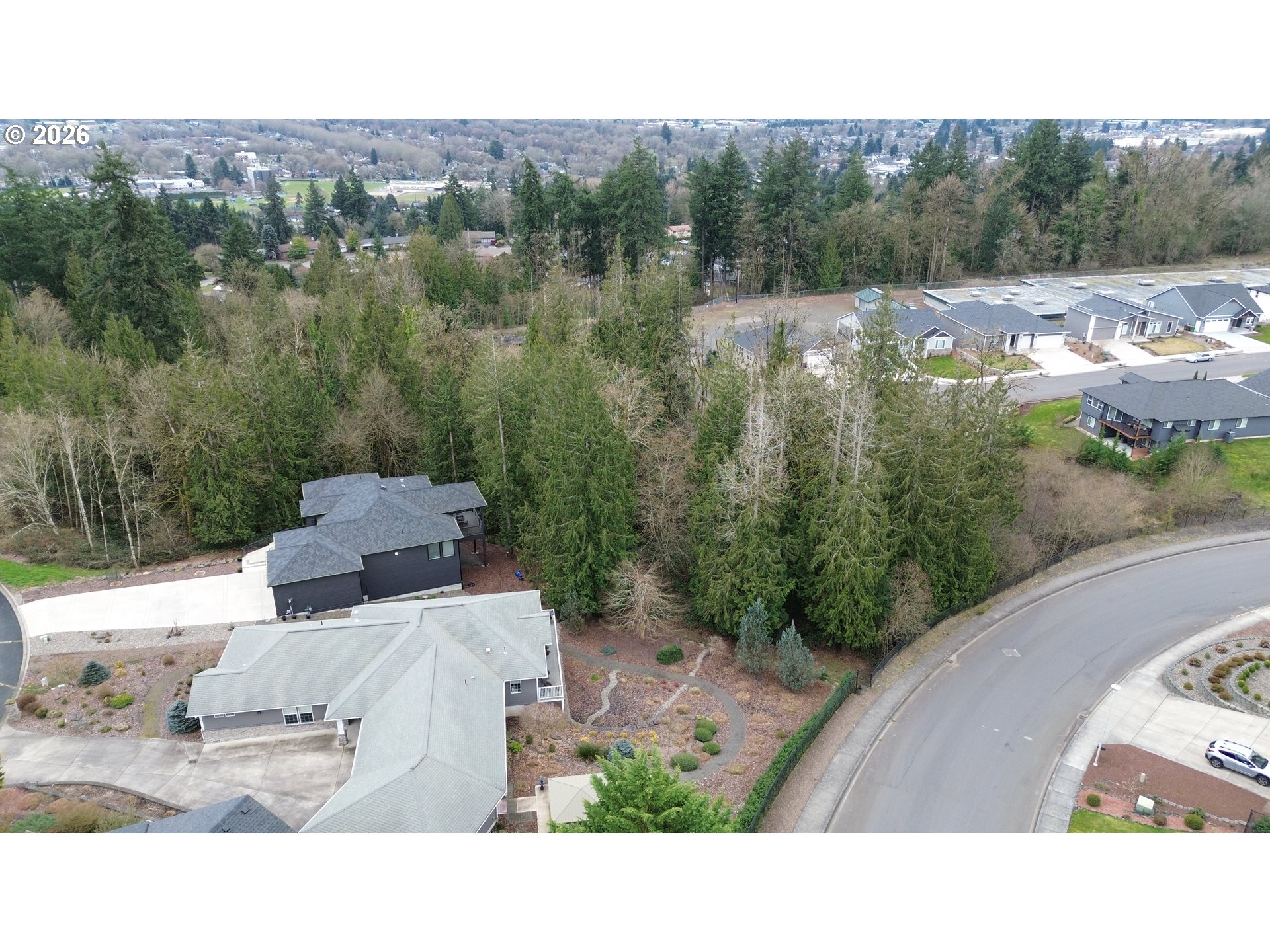 4 Forest Hill Estate Longview, WA 98632 - Photo 8 of 12 a upper view of a house with a yard