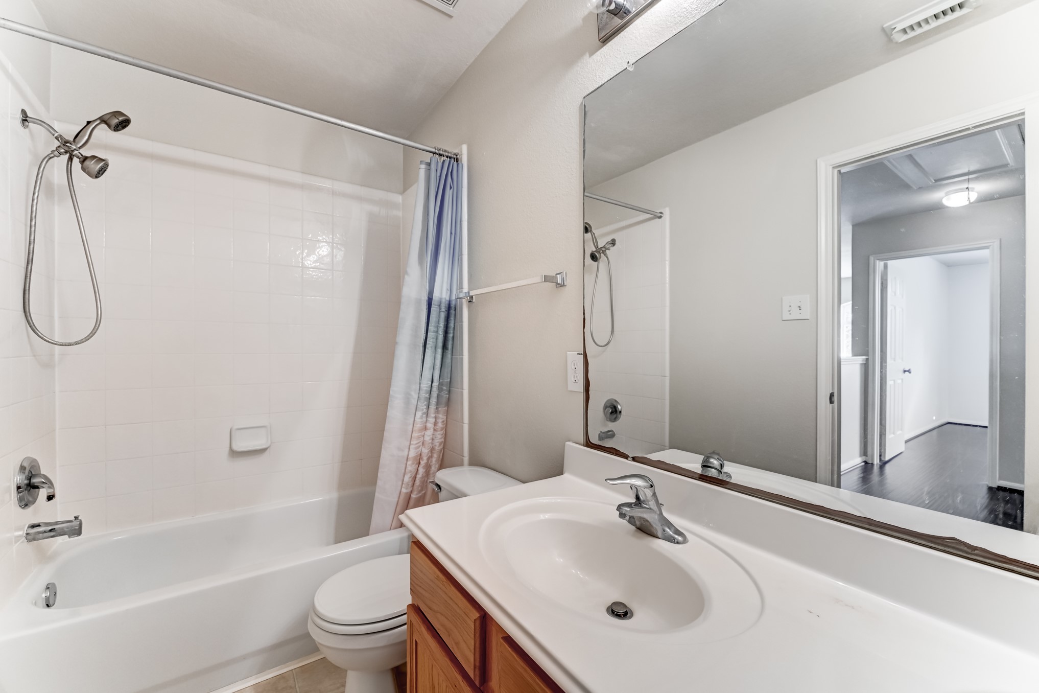 14914 Forest Enclave Lane Houston, TX 77068 - Photo 37 of 49 a bathroom with a sink toilet tub and shower